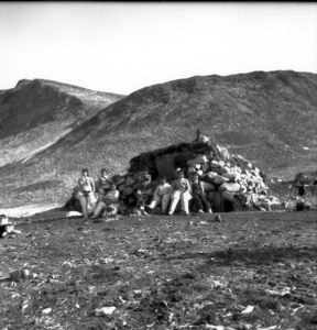 Image of Eskimo [Inuit] family and igloo [iglu], Meteorite Is., Savigsuit