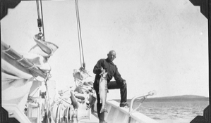 Image: Frank Henderson aboard, holding large fish
