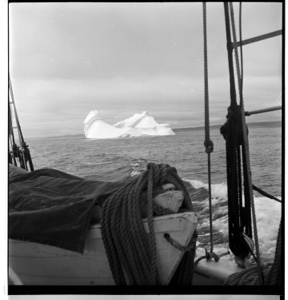 Image of FIrst iceberg, seen through rigging