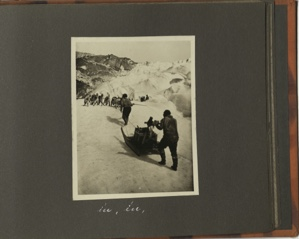 Image of in, in, [on, on: dog team, men, sledges ascend rugged glacier]