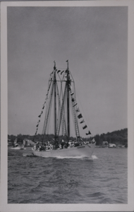 Image: Schooner BOWDOIN at Boothbay Harbor, dressed and under way; guests aboard