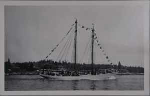 Image of Schooner BOWDOIN at Boothbay Harbor [?], dressed; guests aboard