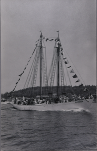 Image of Schooner BOWDOIN under way at Boothbay Harbor [?] dressed; guests aboard