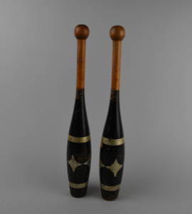 Image: Pair of Indian Clubs, painted black with silver stars and stripes