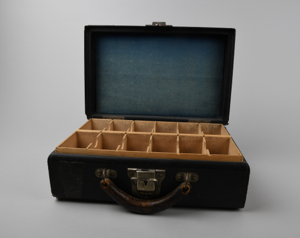 Image of Leather case labeled North Pole lecture, originally filled with 163 glass slides