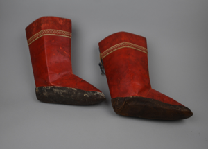 Image of Red sealskin Kamiit [boots] with band of red and white avigtat at top