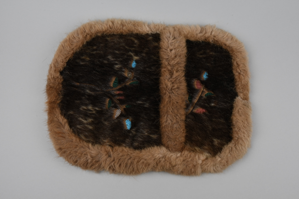 Image: Fur pouch of sealskin, with pocket lined in cotton print and multi-color beads