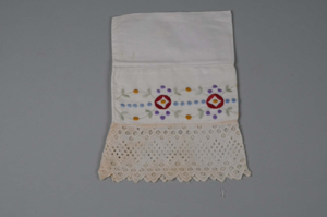 Image of pair of embroidered lace-trimmed cuffs to decorate tops of women's inner boots