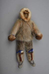 Image: doll in sealskin outfit wtih bead-decorated boots