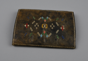 Image: (faded) black leather mosaic work pocketbook-style  wallet