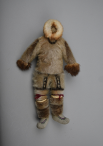 Image of doll in sealskin outfit
