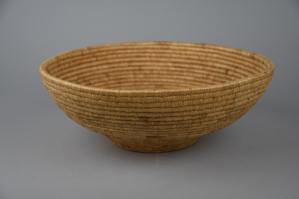 Image: woven grass basket in simple storage shape