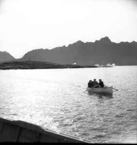 Image of Eskimos [Inuit] approaching The Bowdoin, in open boat