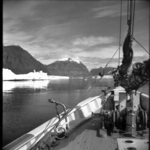Image of Iceberg, mountains off bow, Umanak Fjord