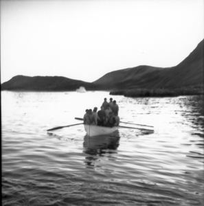 Image of Eskimos [Inuit] in boat, Meteorite Is., Savigsuit