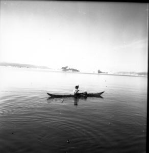 Image: Eskie [Inuk] in kayak, Inglefield Fjord