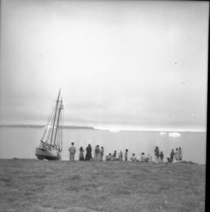 Image of Eskies [Inuit] on beach
