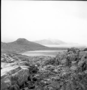 Image of Rocks and harbor, Seaplane Harbor