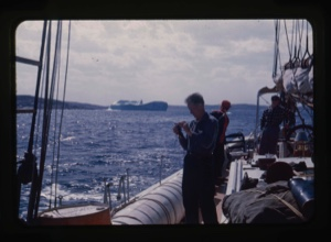 Image: Bill Powers on deck. Iceberg beyond.