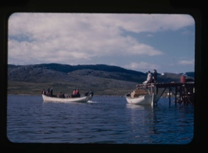 Image: boatload of Eskimos [Inuit] approaching dock