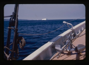Image of iceberg through rigging
