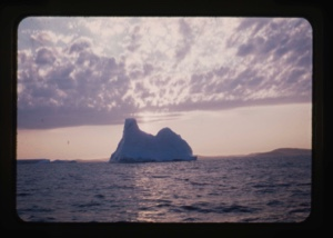 Image of Iceberg and sunlit clouds, entrance to Gulf of St. Lawrence