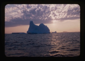 Image: Iceberg and sunlit clouds, entrance to Gulf of St. Lawrence