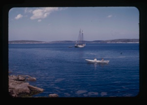 Image: the Bowdoin moored. Dory in foreground