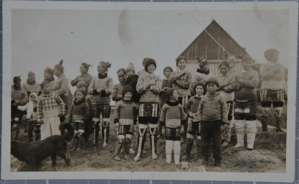 Image of "Family Group" [Inuit outside a colonial building]