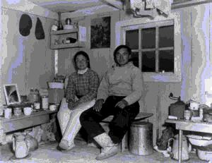 Image: Sorkak and wife in igloo [iglu]
