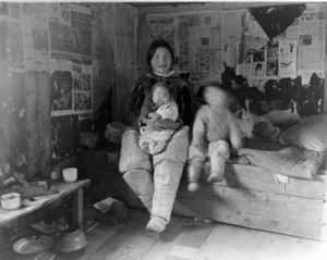 Image of Eskimo [Inuit] Family in Igloo [iglu]