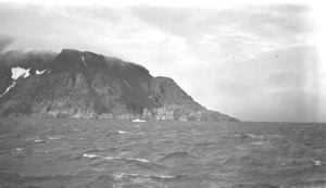 Image: Mountain cliff and rough seas