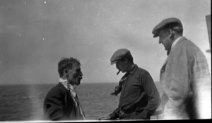 Image of Three men- Whitney with cigar
