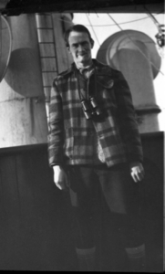 Image: Dr. Johnston with binoculars