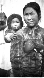 Image of Eskimo [Inuit] mother and baby on deck