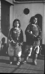 Image of Two Eskimo [Inuit] boys on deck