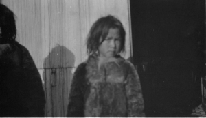 Image of Eskimo [Inuk] boy on deck