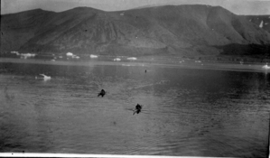 Image: 3 Eskimos [Inuit] in kayaks