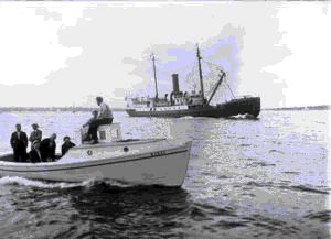 Image of Boats following Bowdoin out of Portland harbor, taken from Bowdoin