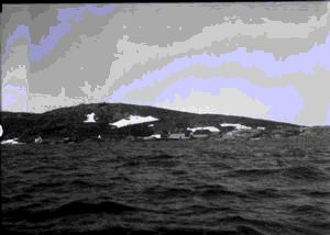 Image of Hopedale, seen from little boat in harbor
