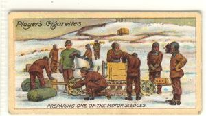 Image of Cigarette card: Preparing one of the Motor Sledges for the Southern Journey