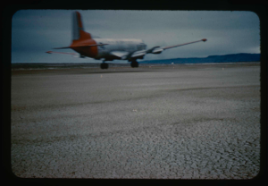 Image of C-124 coming in for test landing on runway at Bronlunds Fjord.
