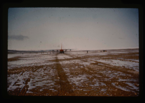 Image: C-130 landing on Air Force runway.