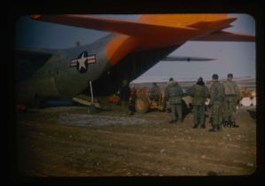 Image: Loading of C-130 aircraft with equipment and personnel after aircraft landing 
