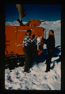 Image of Drilling 90 holes in lake ice cover to determine thickness. Stan Needleman