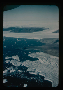 Image: View of Bronlunds Fjord from the air. Note floating icebergs.