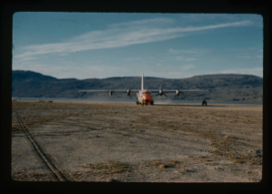 Image of C-130 aircraft after landing on airstrip at Centrum Lake.