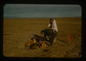 Image of Marking runway orientation for surveying. Lt. Col. Wilson and Stanley Needleman.