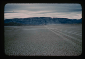 Image of Tire tracks of C-124 aircraft after 1st test landing, Bronlunds Fjord test site