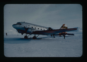 Image of Air Force C-47 on skis lands on Ellesmere Island Ice Shelf.